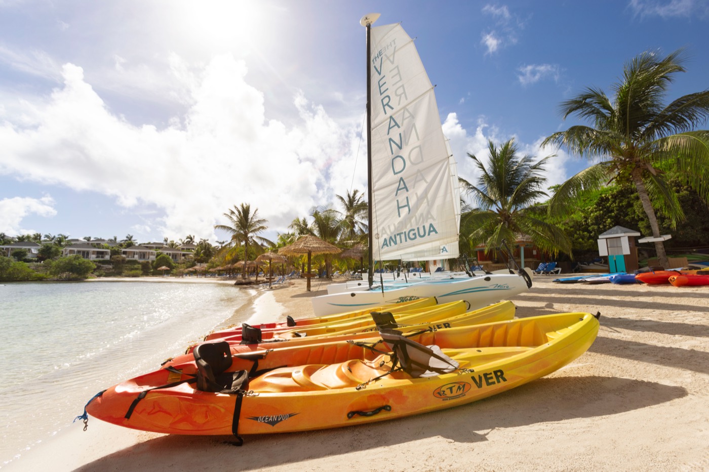 Kayaks lined up on the beach