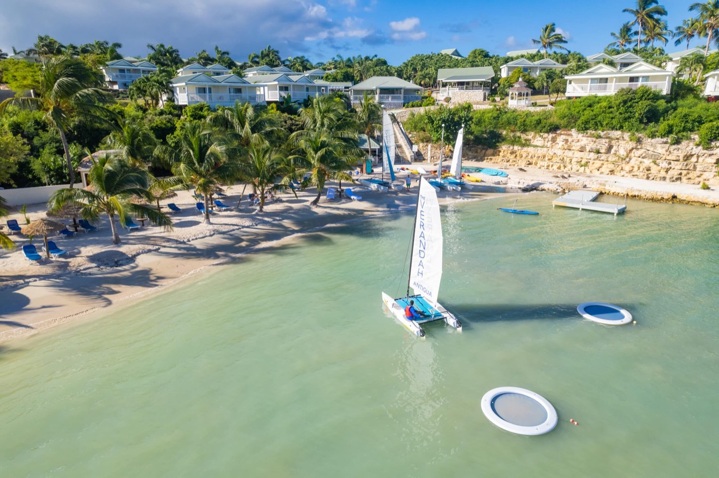 Lover's Beach with a Hobie Cat pulled up on the sand