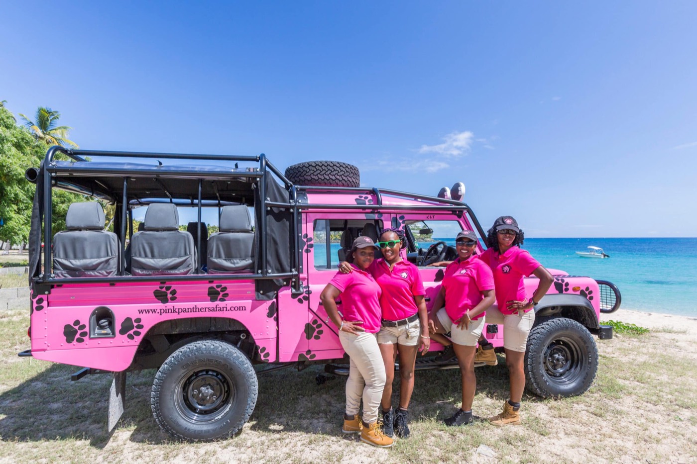 Pink Panther Safari jeeps and guides on the beach
