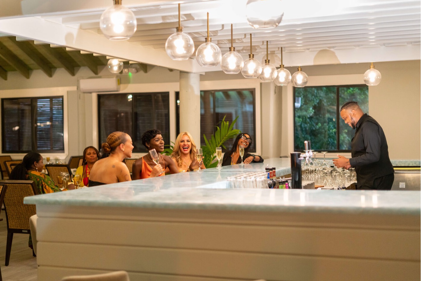Friends sharing drinks at the bar