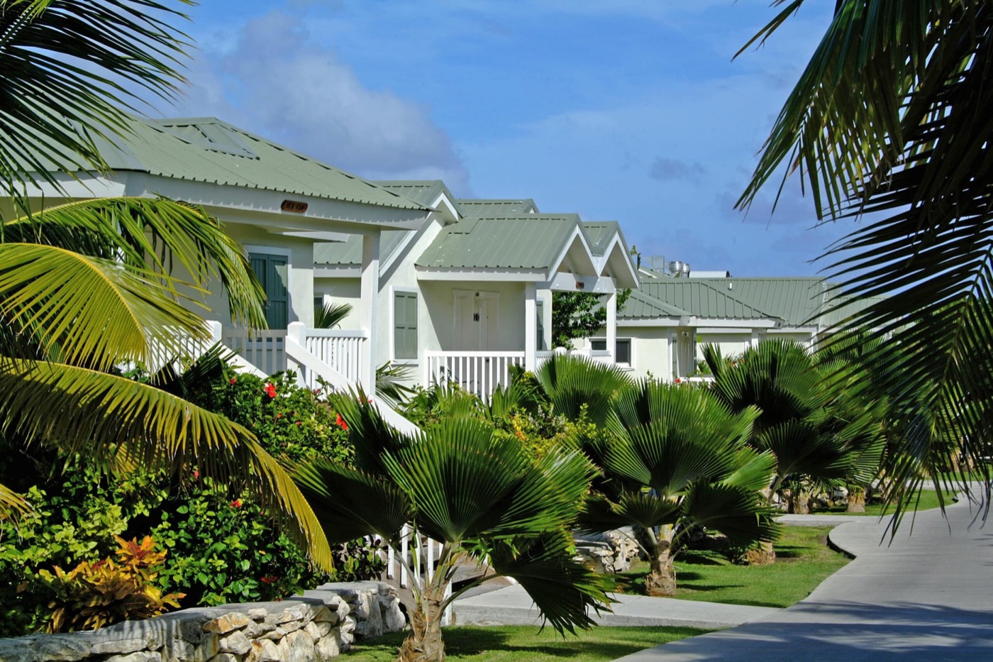 Hillside cottages along a garden walking path