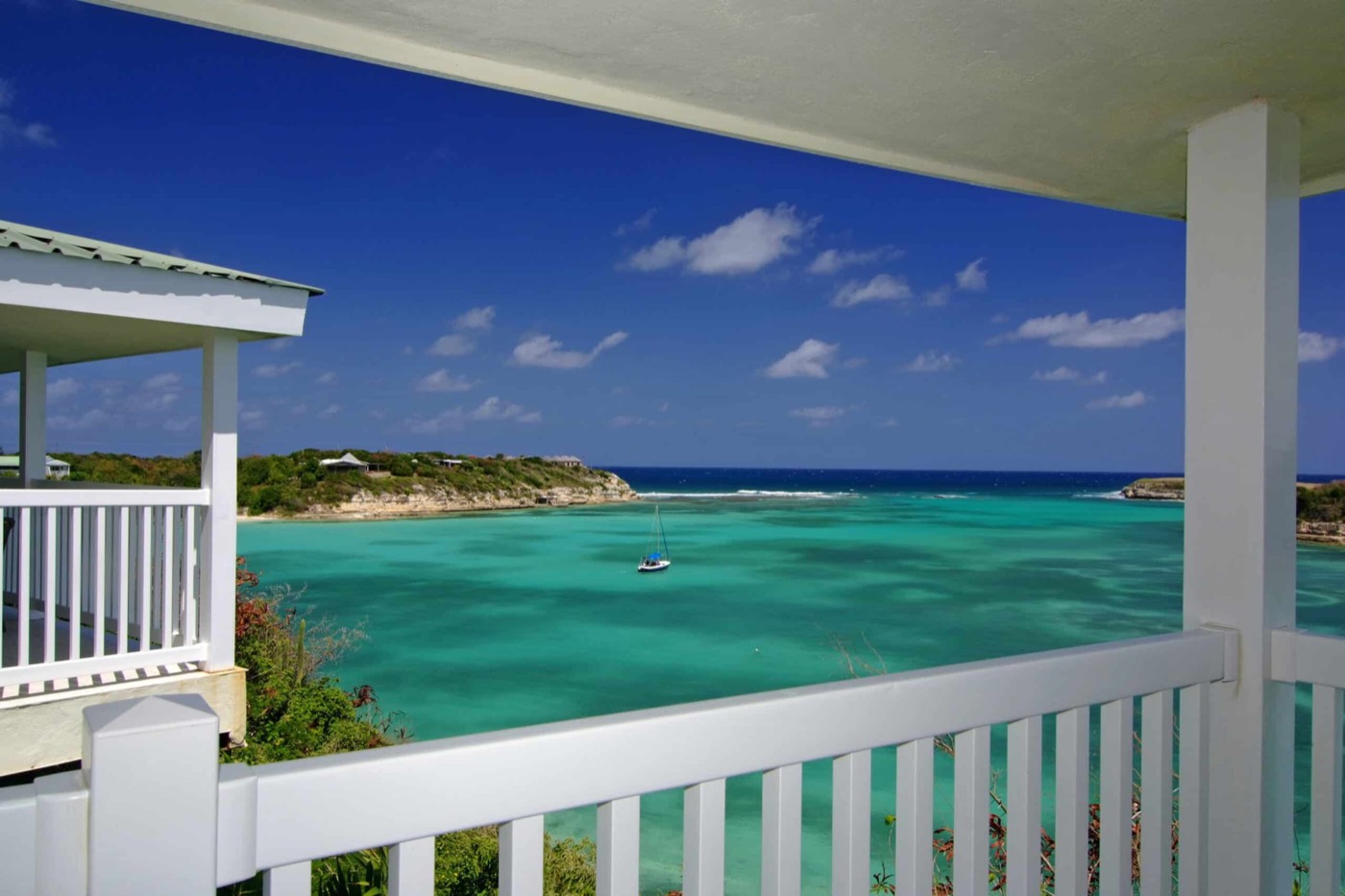 View from a Superior Waterfront verandah across turquoise water